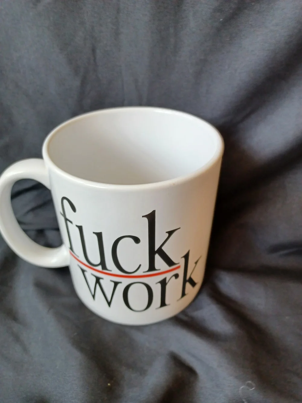 White Mug with Bold Black and Red Text